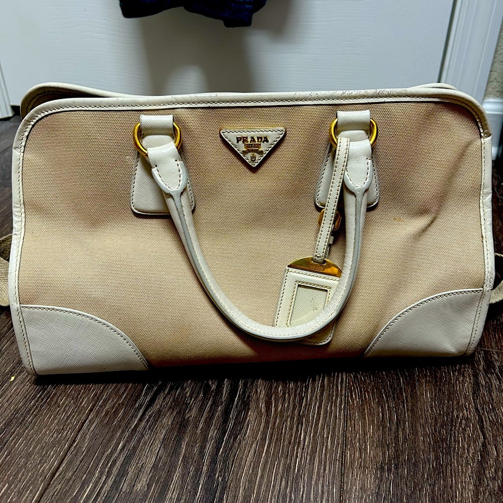 Selling this much loved authentic Prada hand bag with or without shoulder strap